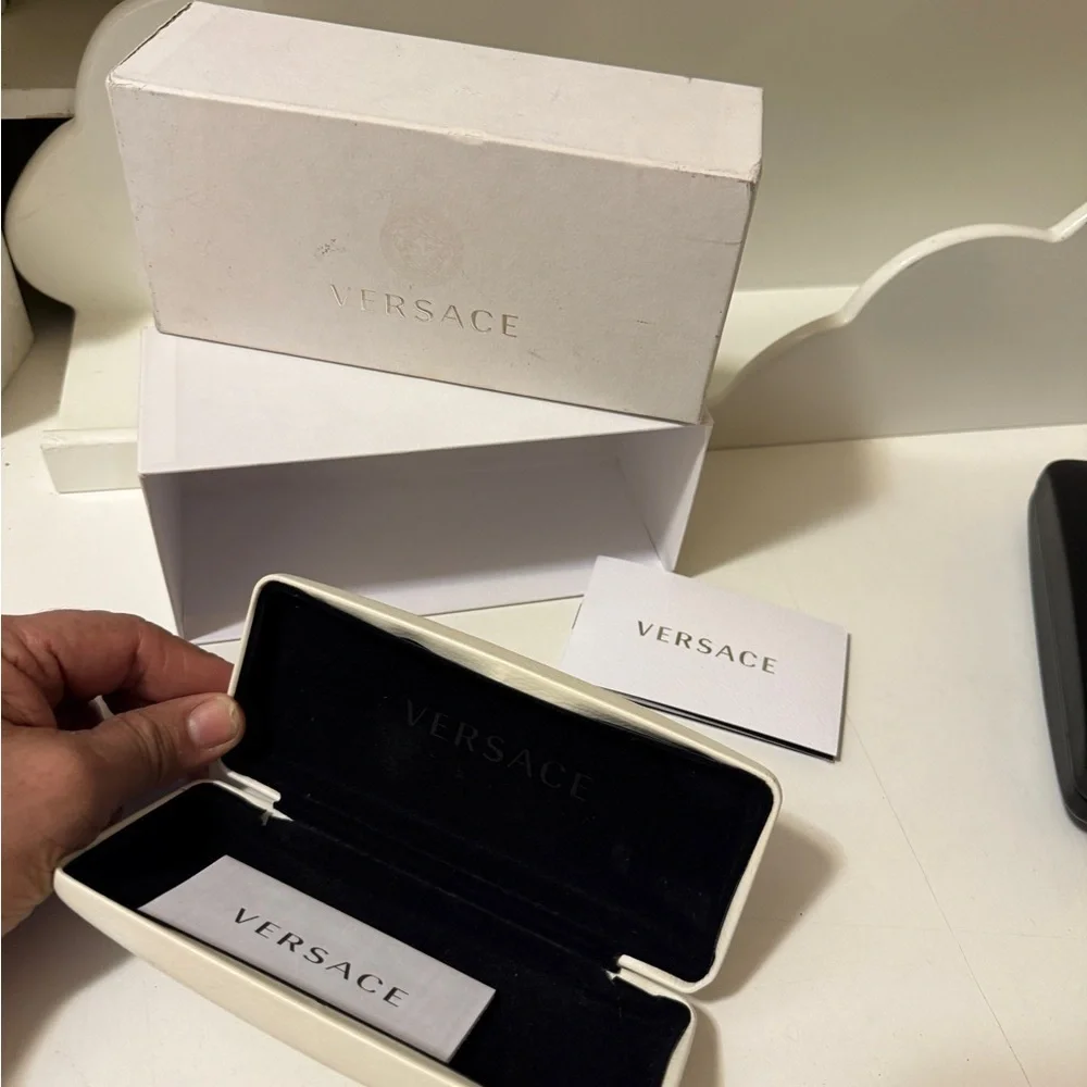Two original Versace sunglasses case with new conditions